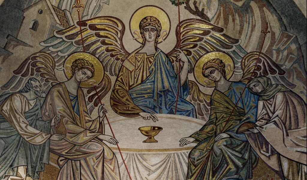 Christian mosaic showing three haloed figures seated around a table.